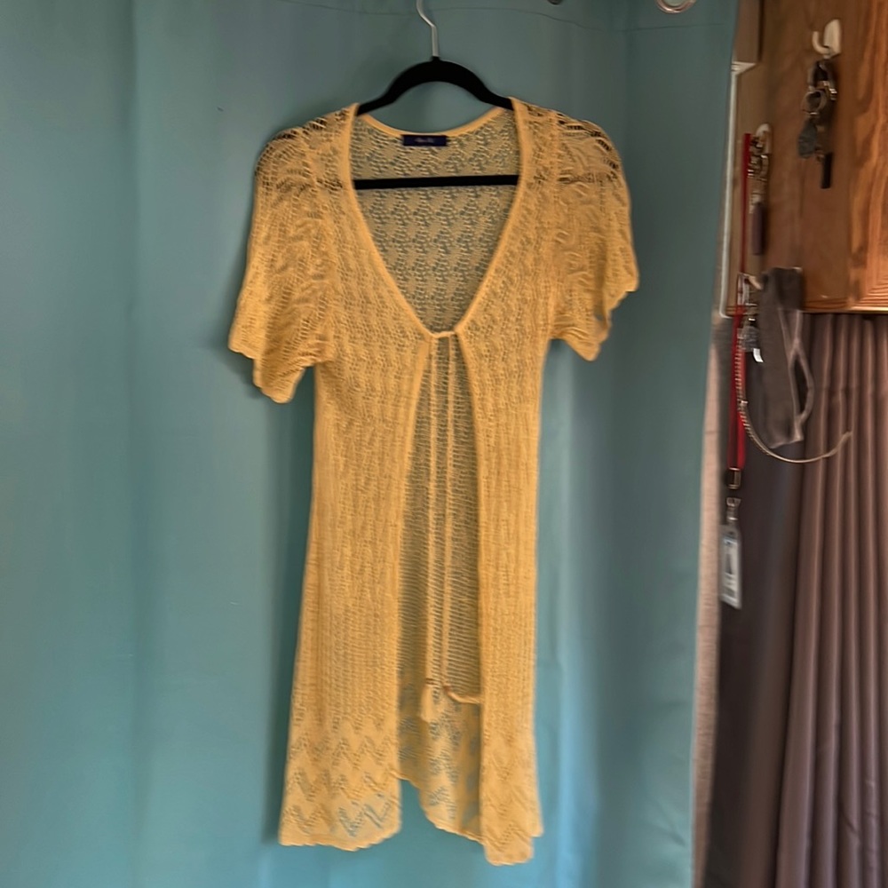 Yellow over coat in perfect shape. Med size.